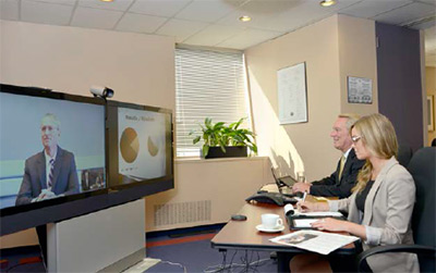 Photo of video-conferencing in action 