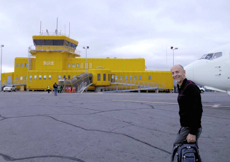 Photo of a CICS employee arriving in Iqaluit for a conference.
